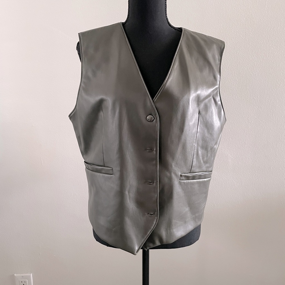 Grey Pleather Vest
Never worn.
